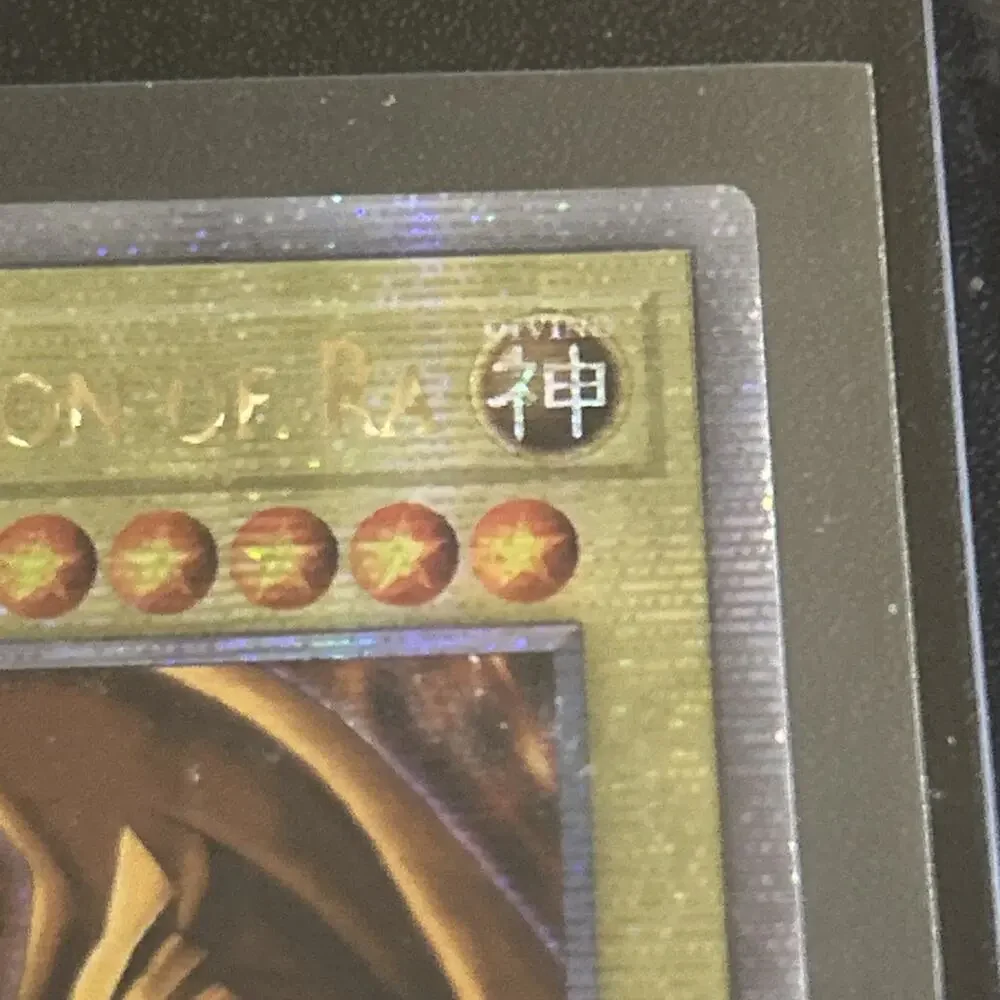 Yugioh ATTRIBUTE MISPRINT “Divino” LC01-EN003 The Winged Dragon Ra QCSR VLP Card